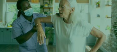 reynolds-male-social-worker-taking-care-old-woman