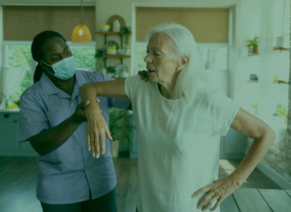 reynolds-male-social-worker-taking-care-old-woman
