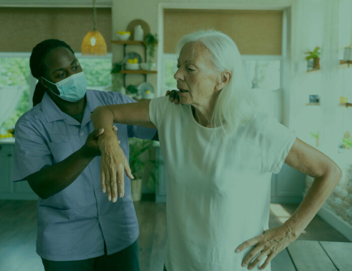 reynolds-male-social-worker-taking-care-old-woman